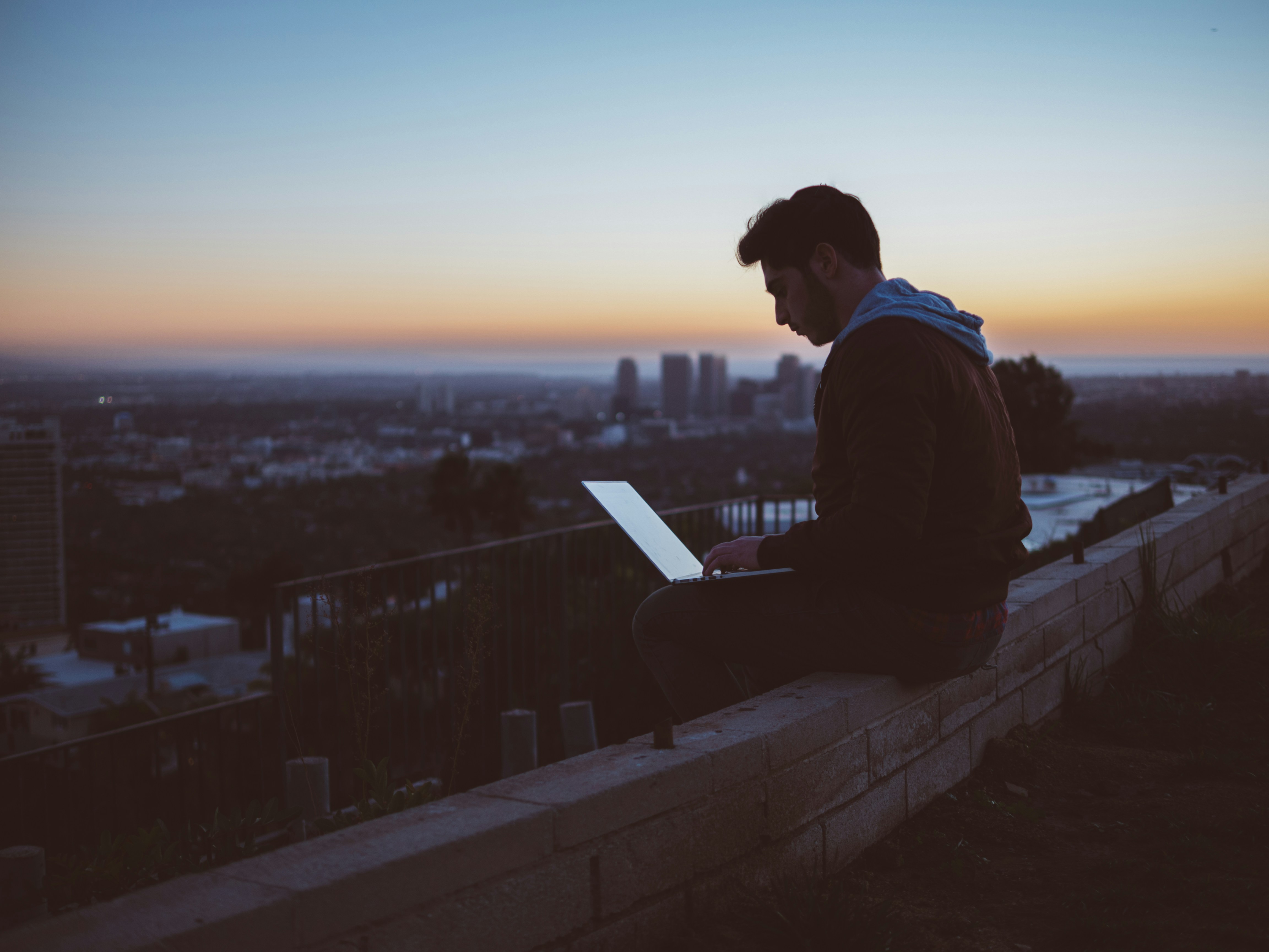 man researching about venture capital deal flow software