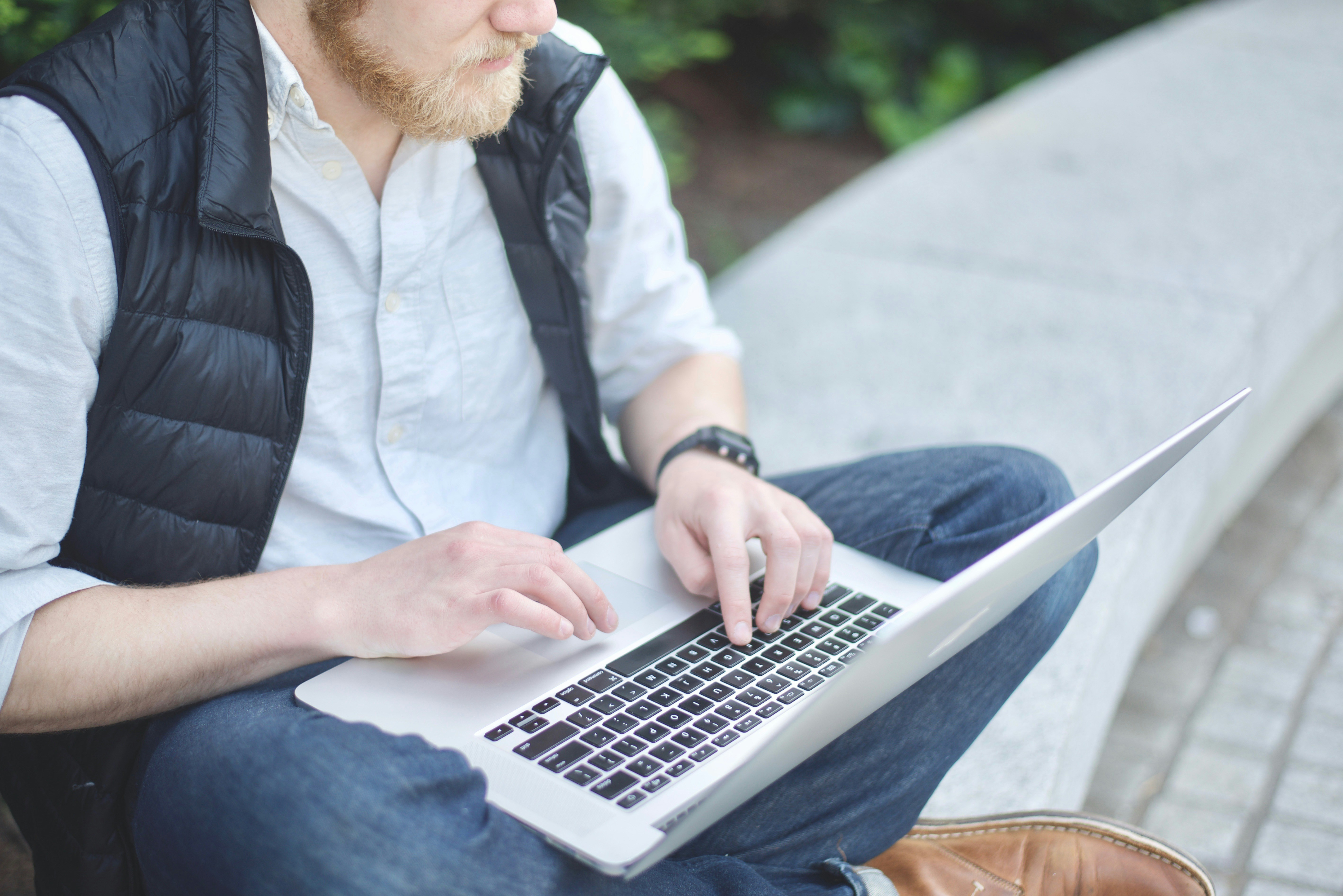 aged man on laptop using investor relations crm