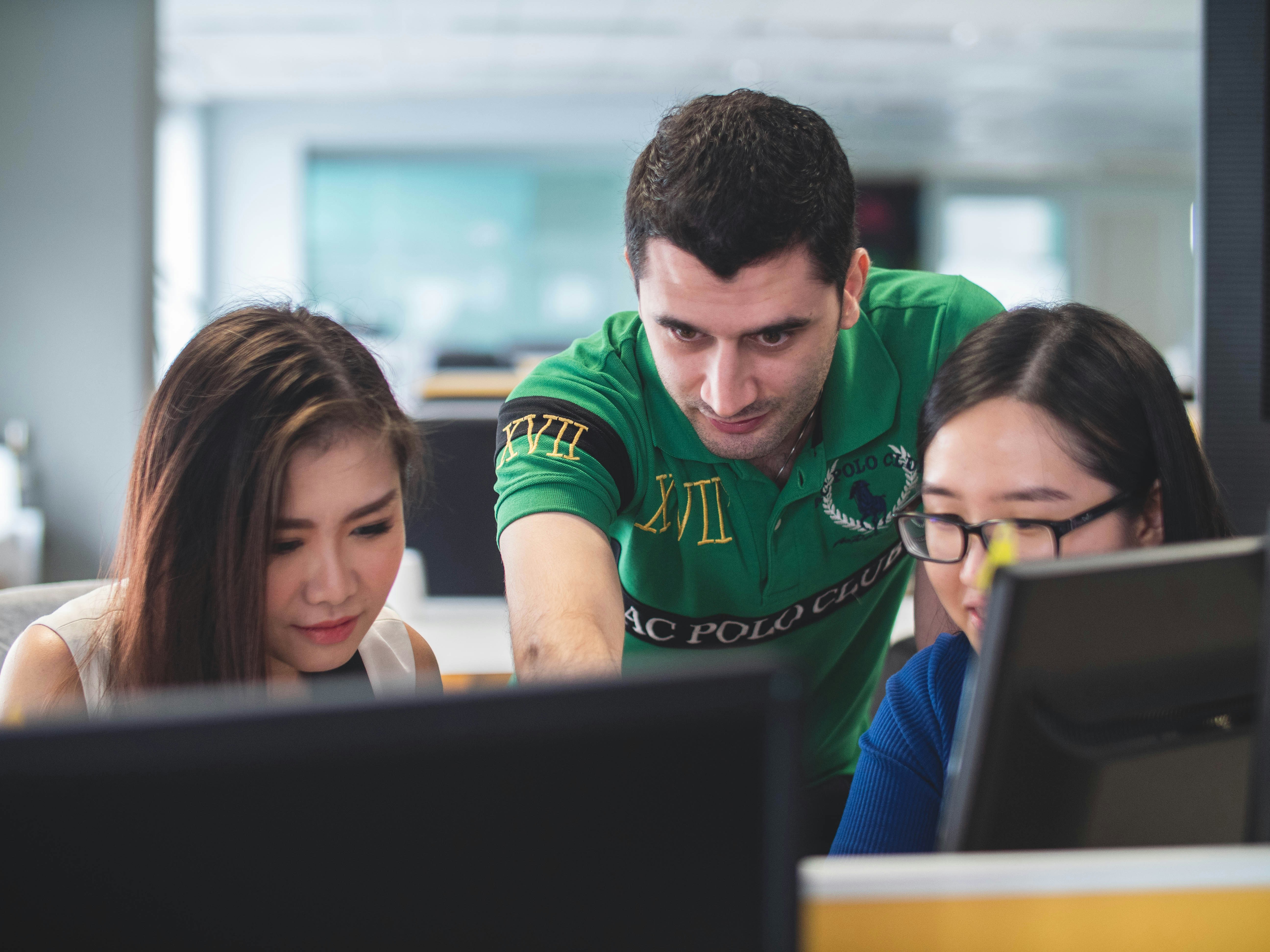 man helping his employees plan for vc deal flow