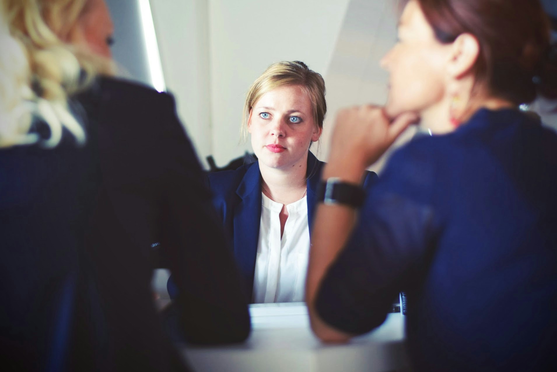 woman pitching infront of VCs - deal flow management